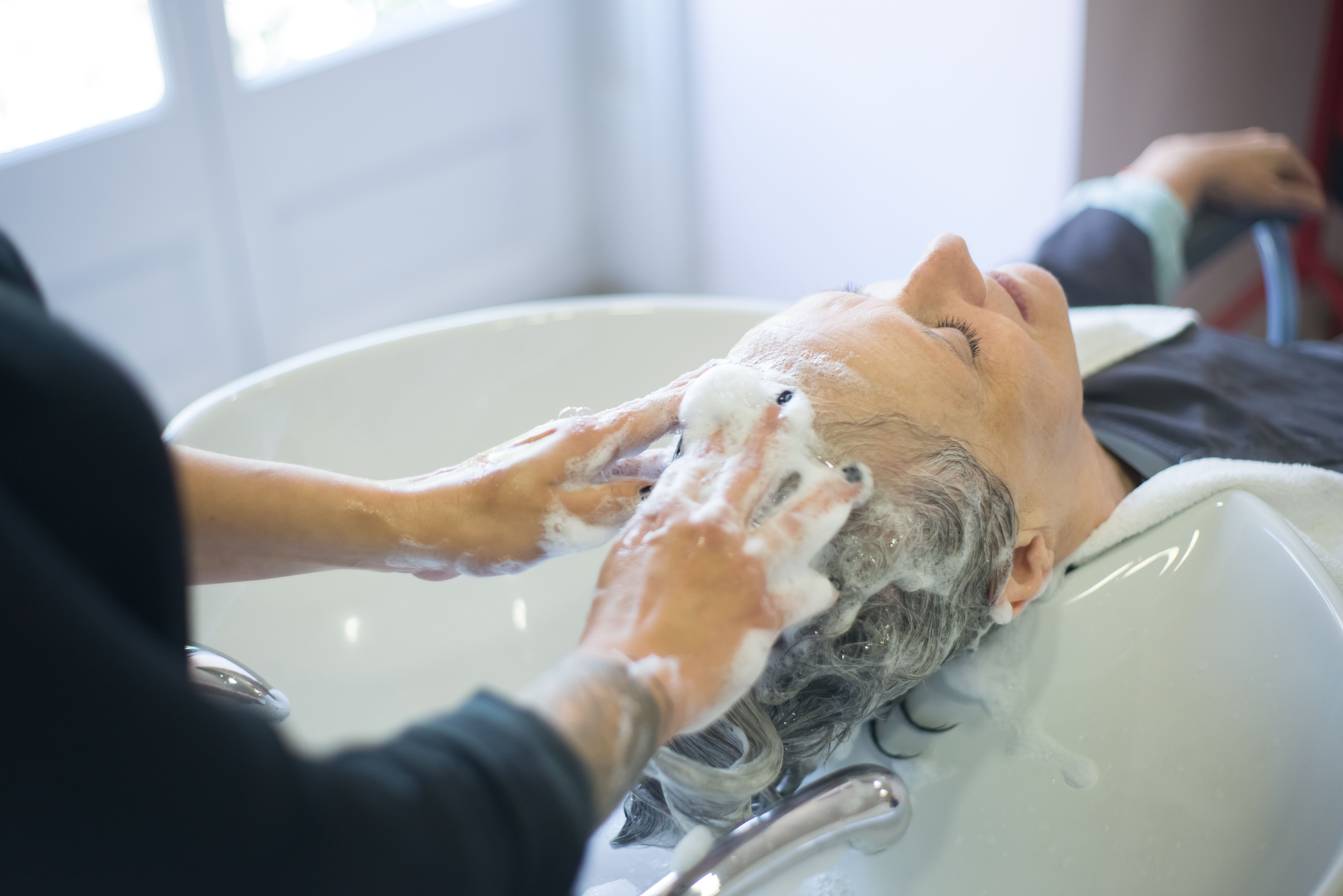 Hair and scalp treatment at Allure Hair Couture