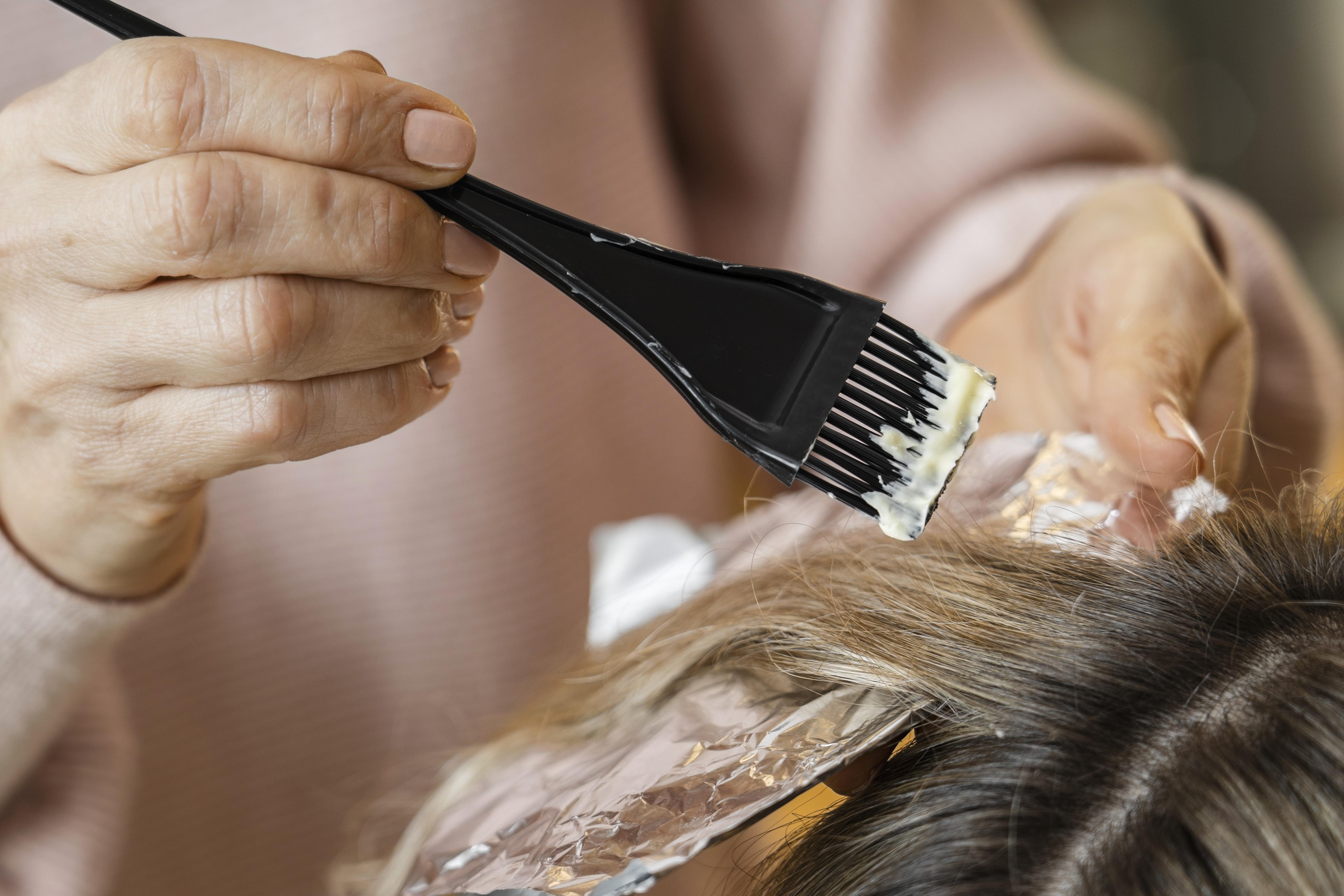 Hair colouring service at Allure Hair Couture